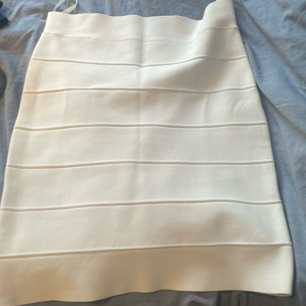BCBG  pencil light beige skirt . Looks new size large